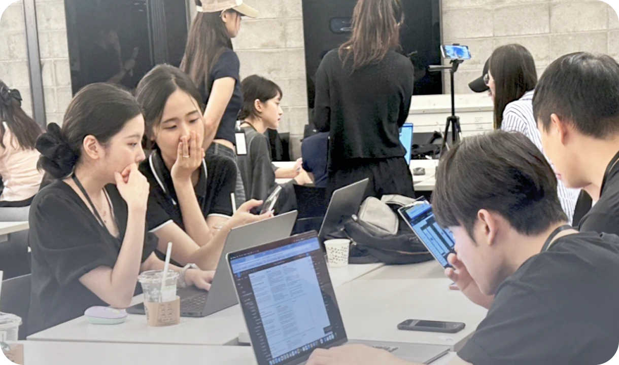 Fans testing the SPOT prototype on their phones